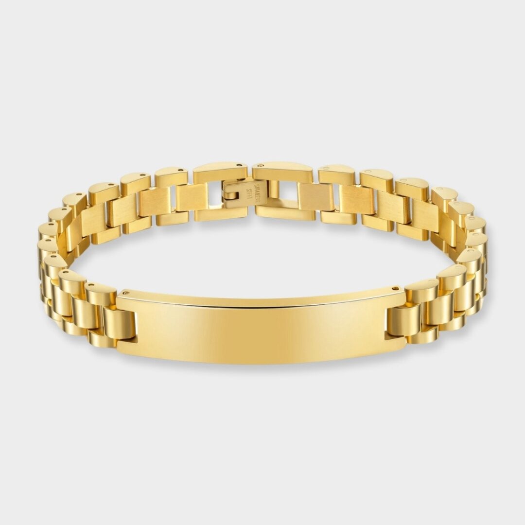 a gold bracelet with a blank tag