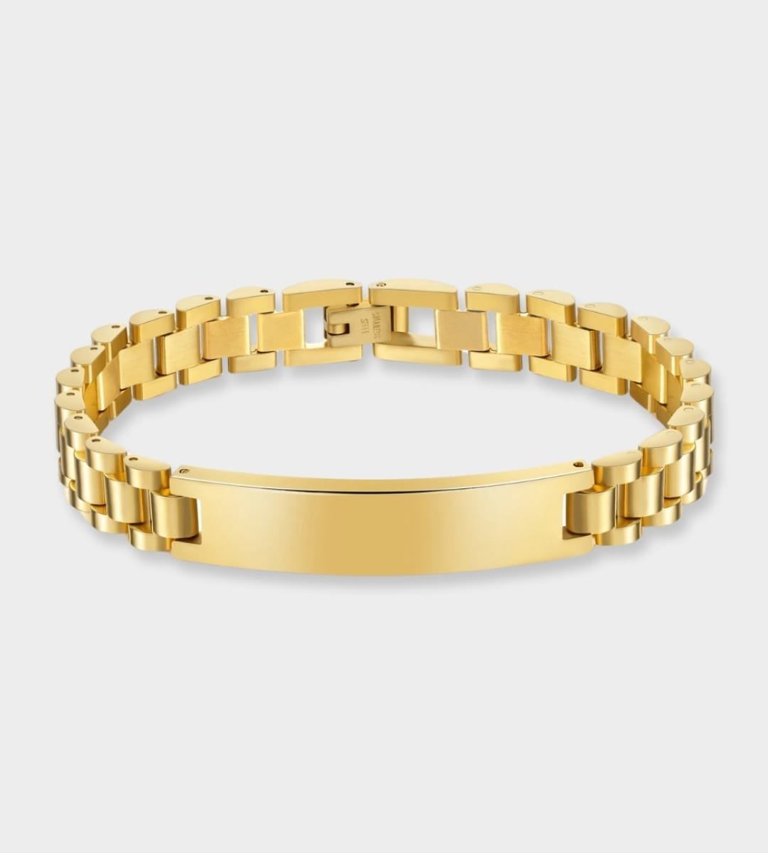 a gold bracelet with a blank tag