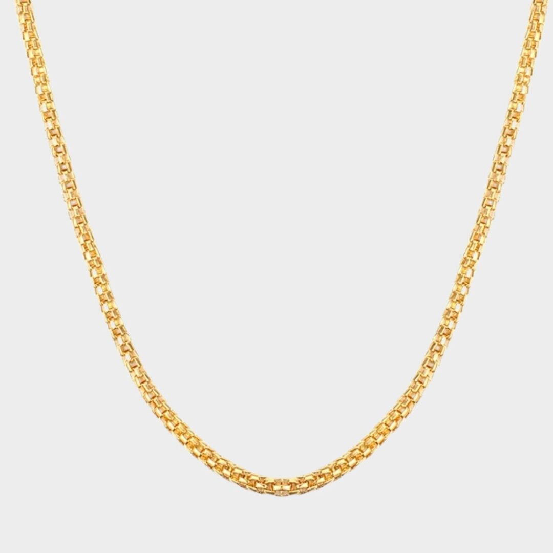 a gold chain on a white background